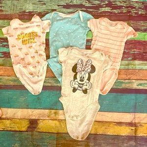 Four shirts 0-3 months